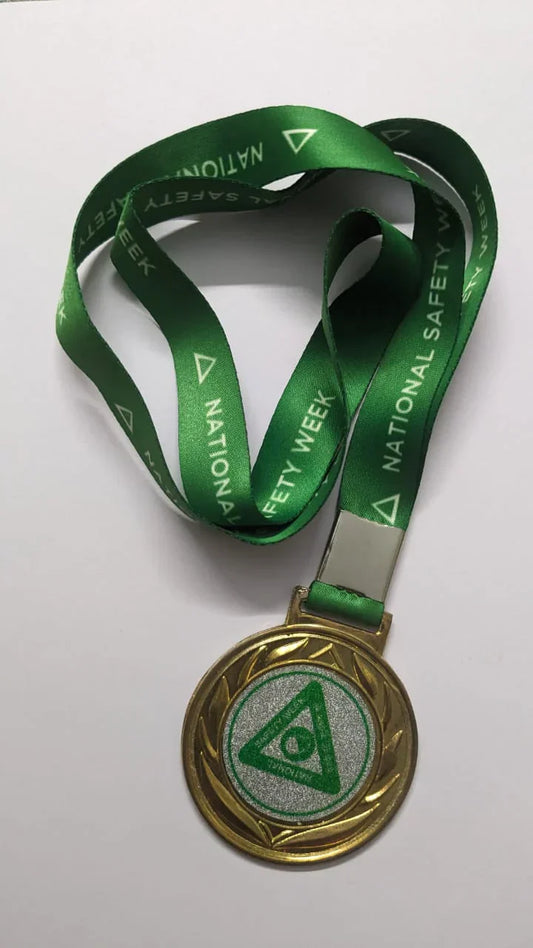 Golden Safety Week Medal – Brass Metal with Green Ribbon