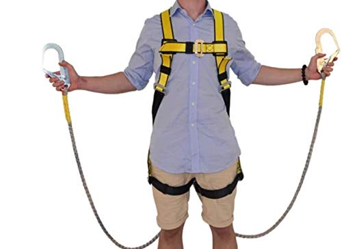 A person demonstrating the use of a Safedot Double Hook Fall Arrester with a full body safety belt, featuring yellow and black coloration, attached to two hooks.