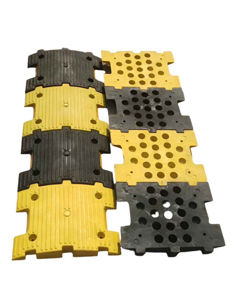 MIXTURE OF RUBBER & PLASTIC SPEED  BREAKER SIZE: 350W X 250L X 50H MM  (YELLOW/BLACK COLOR)WITH  REFLECTIVE CAT EYES